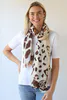 Model wearing Cream/Brown Lightweight Animal Print Scarf By Archer House Available at Beetees Nelson